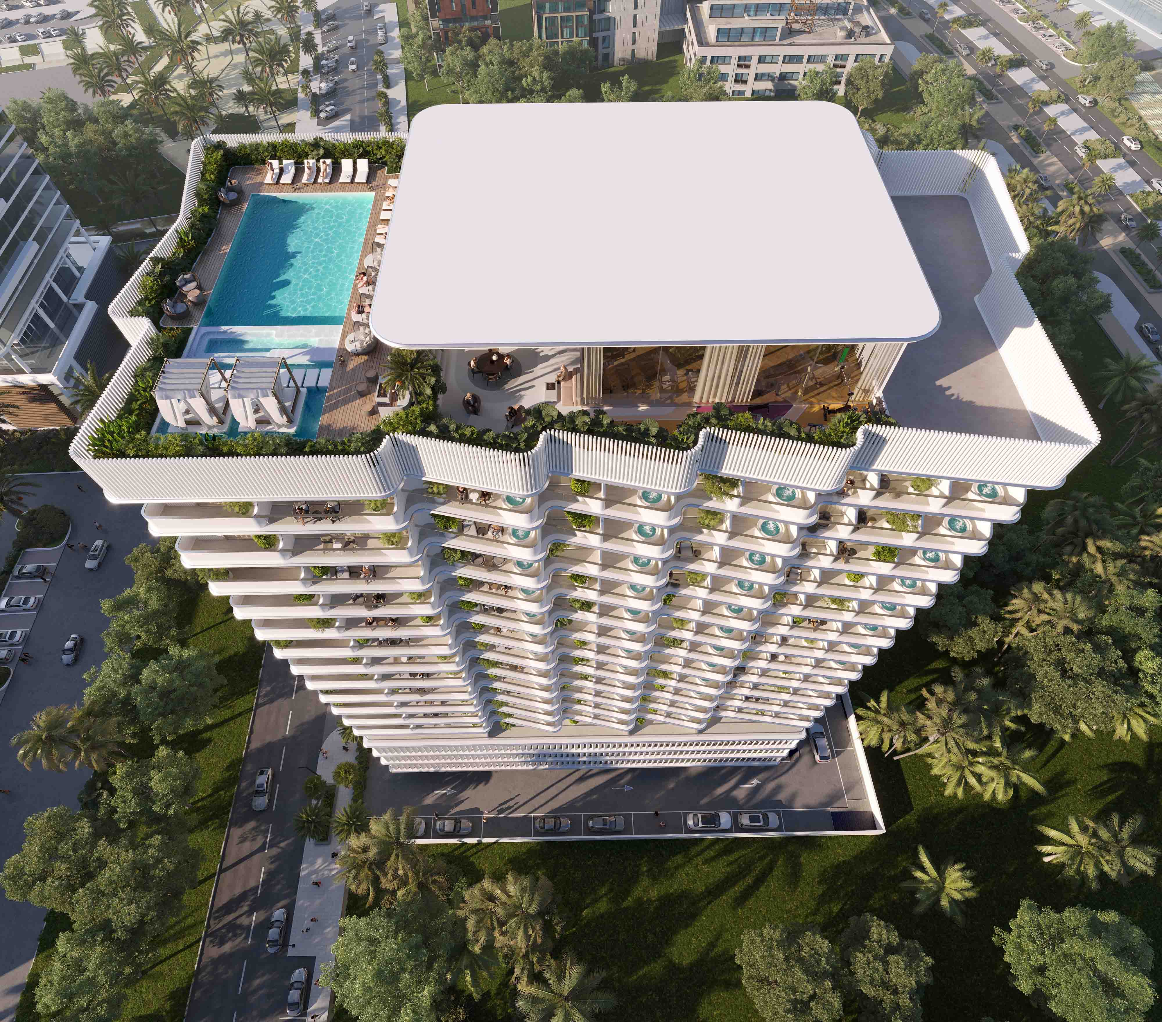Cove Edition I By Imtiaz 1 A modern high-rise building with a rooftop pool, surrounded by greenery and parked cars below.